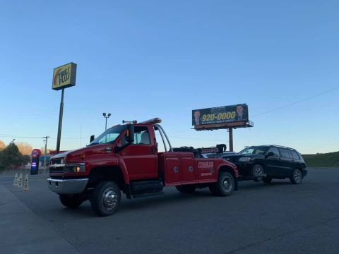 local car truck towing service to tire shop
