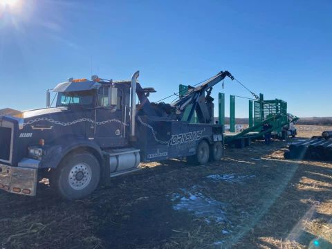 farm tractor combine equipment towing and recovery service